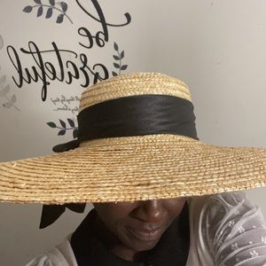 Hat with black ribbon